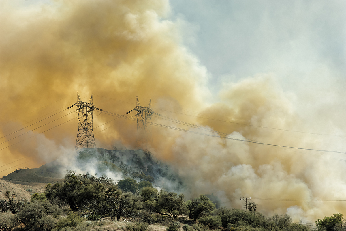 Smoke from wildfire and utility lines image